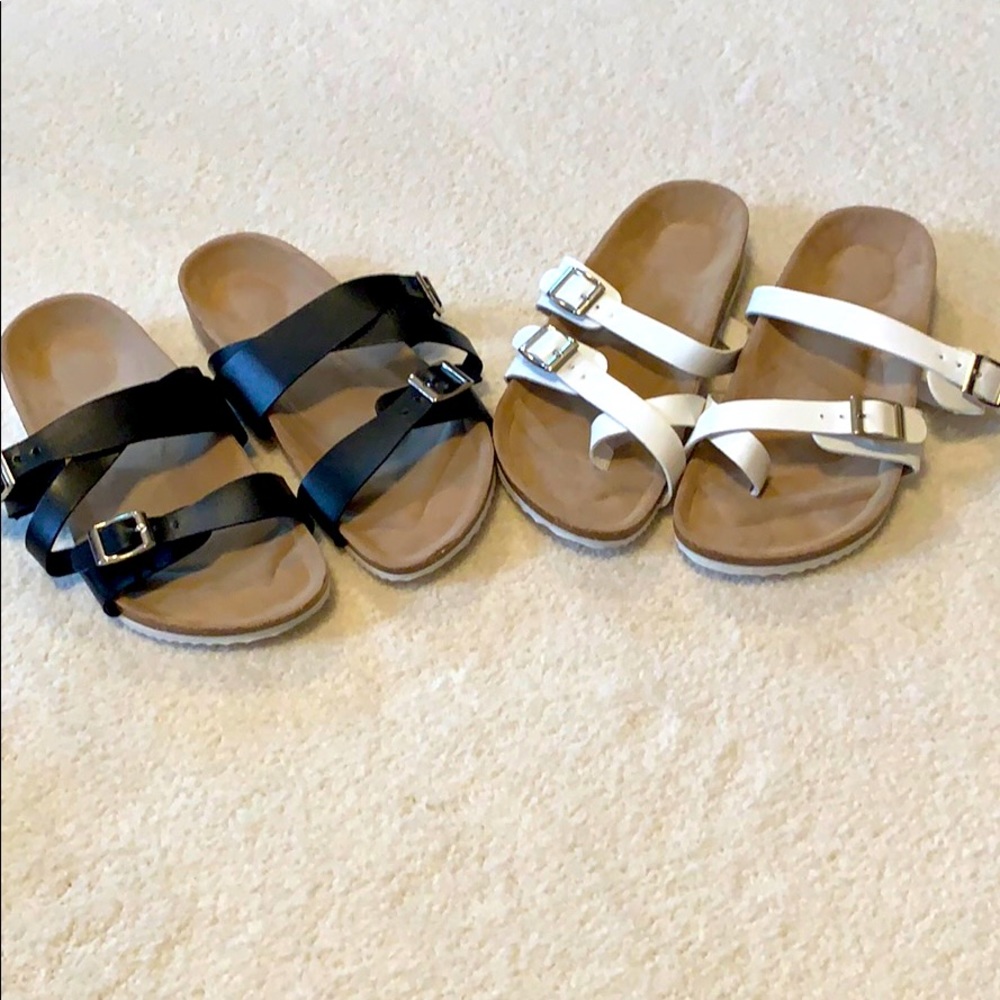 2 pair of Birkenstock style sandals.